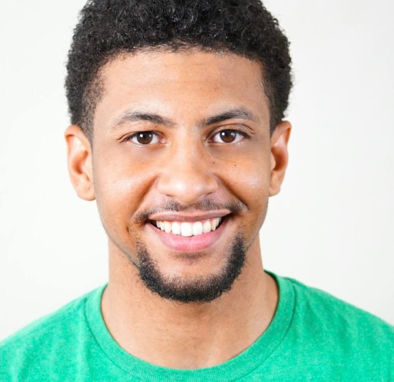 a man in a green shirt
